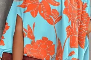 Blusa elegante ampia con stampa, di colore azzurro