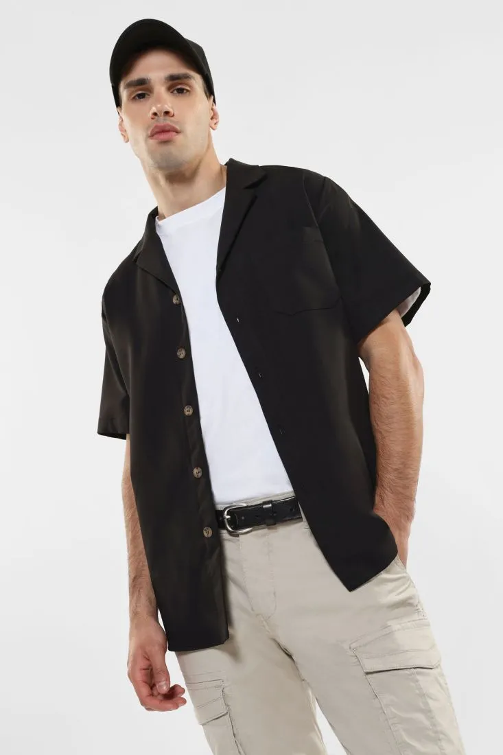 Camicia con bottoni a contrasto e tasca applicata