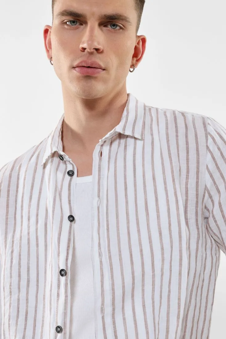 Camicia fantasia rigata in lino con bottoni a contrasto