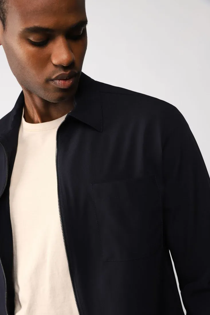 Camicia monocolour con taschini applicati e zip