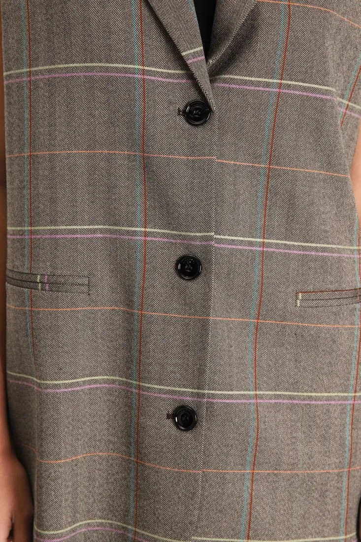 Gilet a quadri con rever a lancia