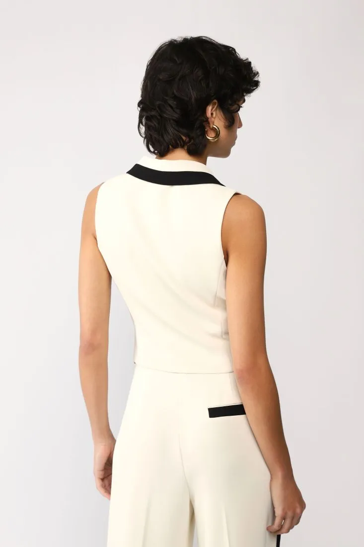 Gilet bicolor con revers a lancia