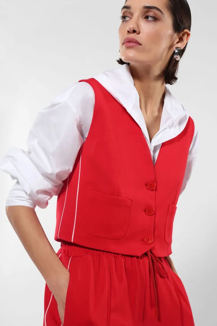 Gilet con taschini applicati e bande laterali a contrasto