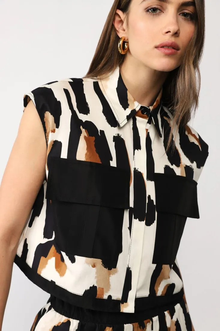 Gilet cropped fantasia astratta con tasche applicate