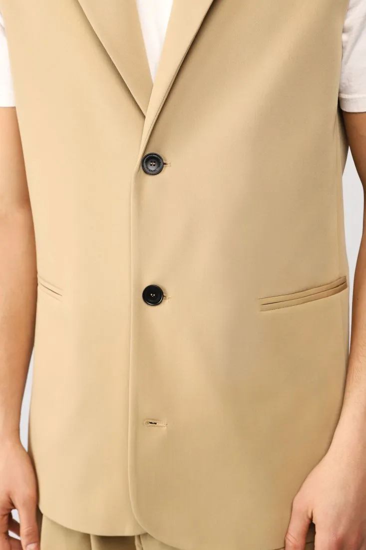 Gilet lungo monopetto monocolour con revers a lancia