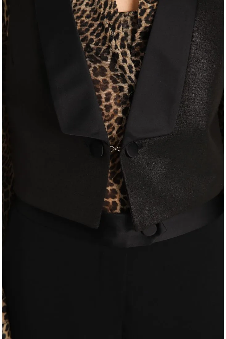 Gilet monocolour con rever e bottone