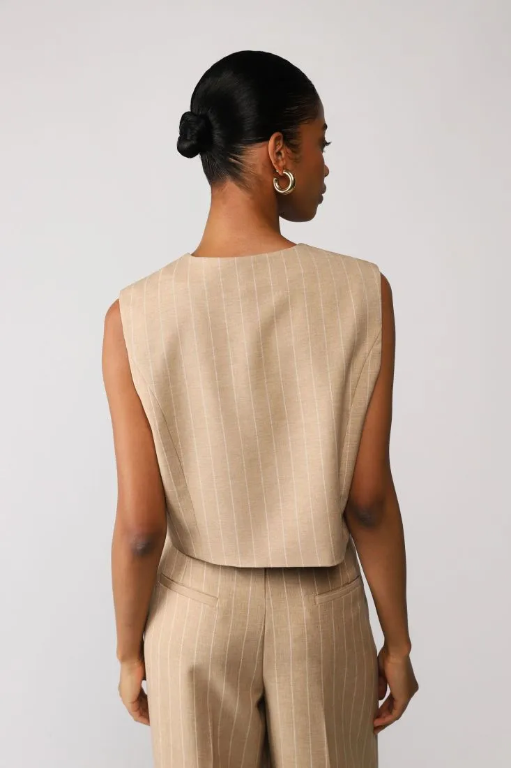 Gilet monopetto cropped a righe con taschino a filetto