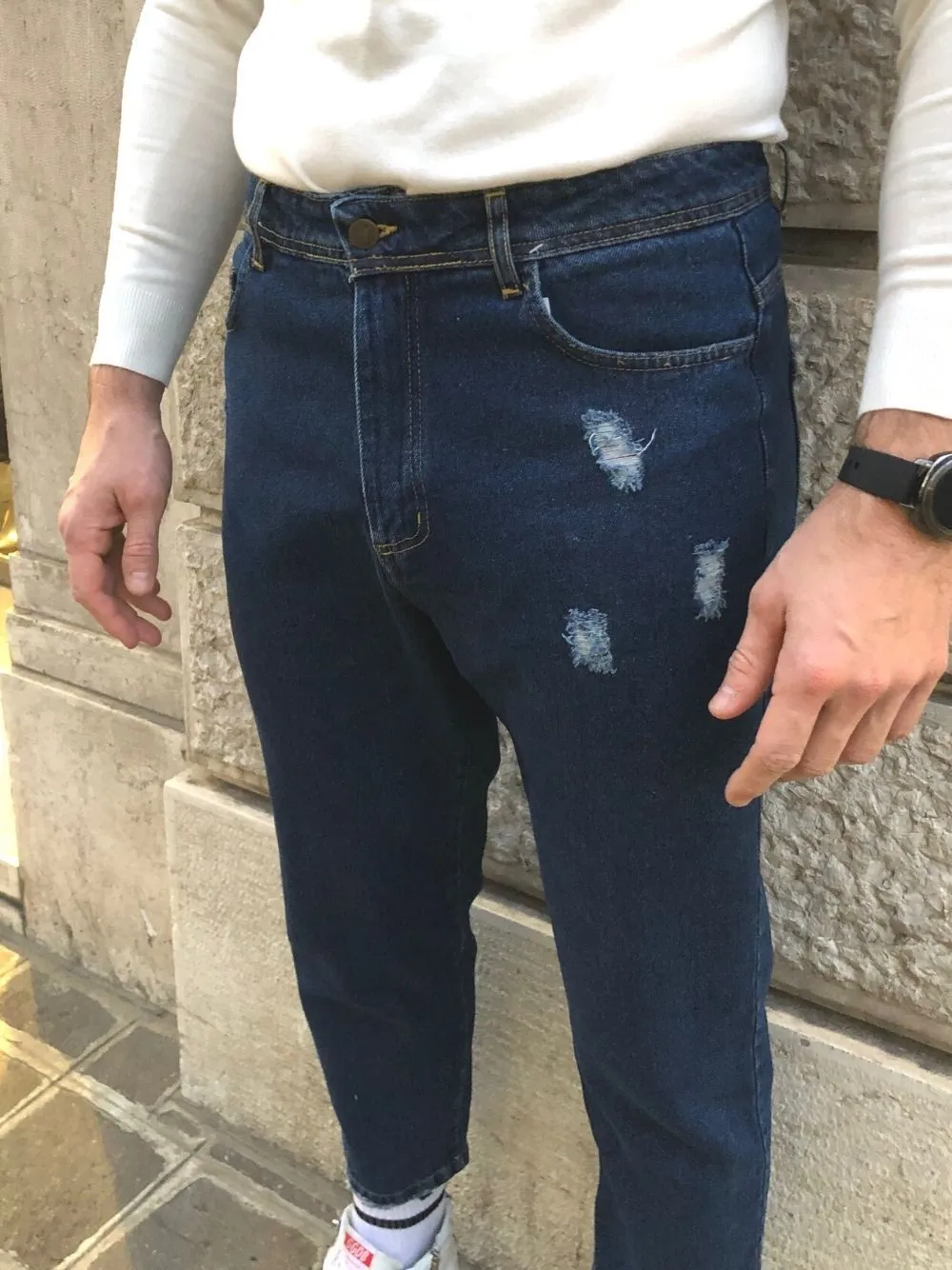 Jeans strappati