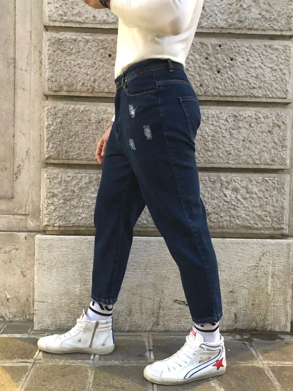 Jeans strappati