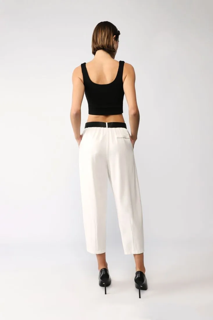 Pantaloni baggy monocolour con cintura tono su tono