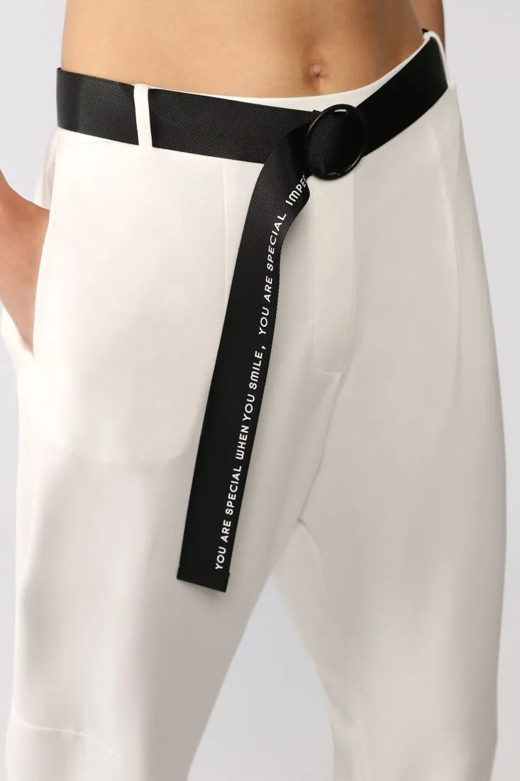 Pantaloni baggy monocolour con cintura tono su tono