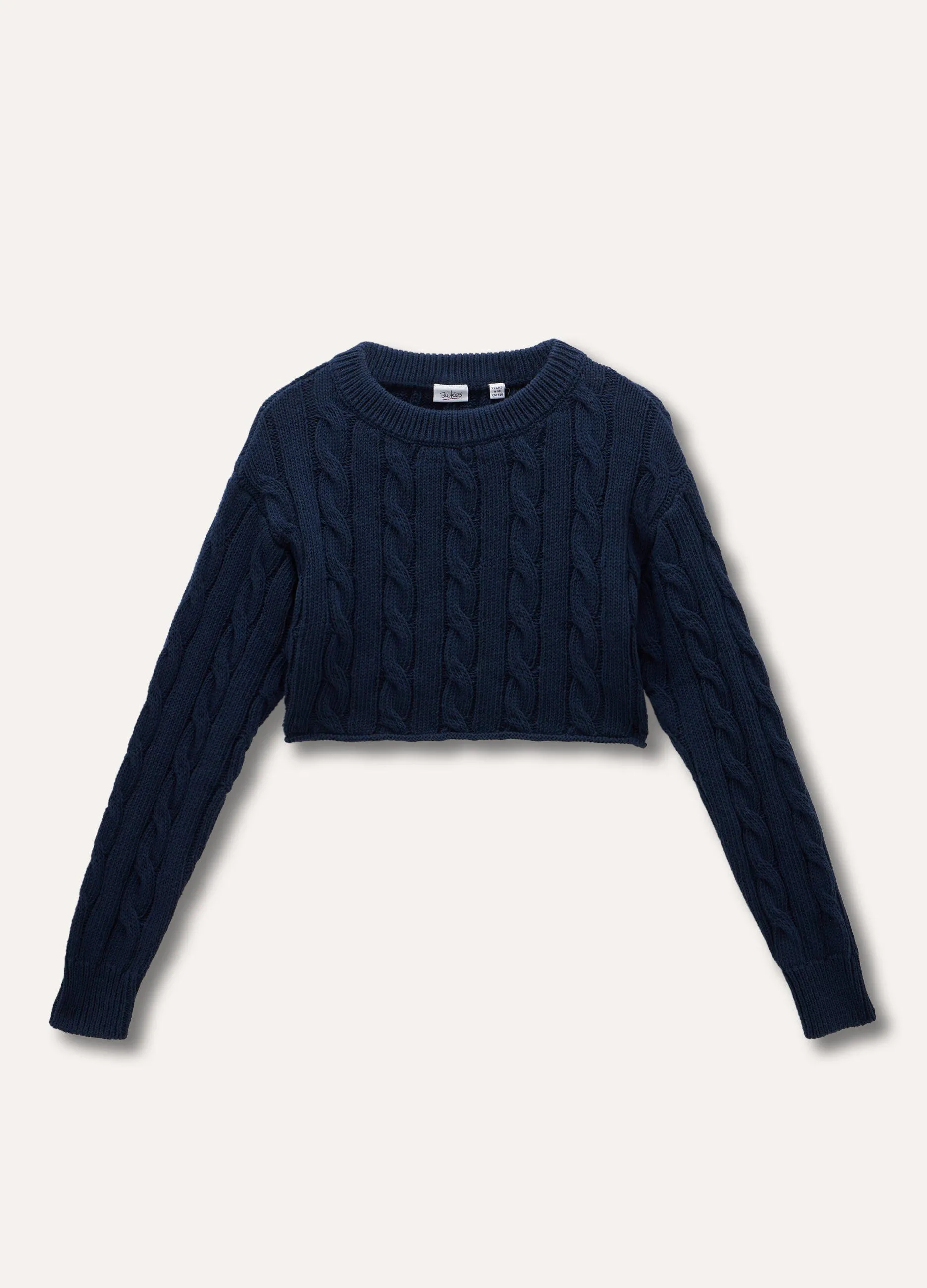Tricot cropped a treccia ragazza